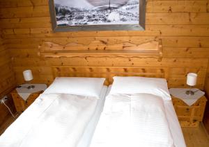 Postel nebo postele na pokoji v ubytování Ferienhaus Gasteg
