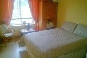 Postel nebo postele na pokoji v ubytování Bunbeg Apartment