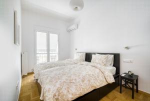 Posteľ alebo postele v izbe v ubytovaní Stylish, Sunny New 2 Bedroom, Prime Central Athens