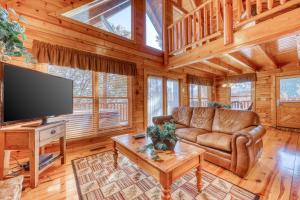 TV a/nebo společenská místnost v ubytování Treehouse