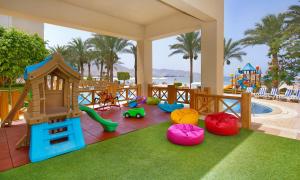 a play area with a playground with a slide at InterContinental Aqaba by IHG in Aqaba