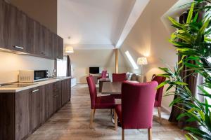 Kuchyň nebo kuchyňský kout v ubytování Empress Boutique Hotel
