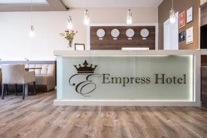 Certifikát, hodnocení, plakát nebo jiný dokument vystavený v ubytování Empress Boutique Hotel
