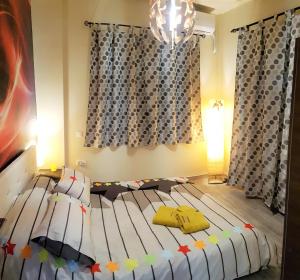 Кровать или кровати в номере Betty's Central Suite