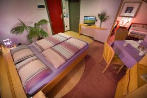 Postel nebo postele na pokoji v ubytování Hotel Marzia
