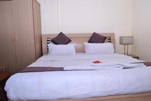 Cama o camas de una habitación en Hotel Mountain Gateway