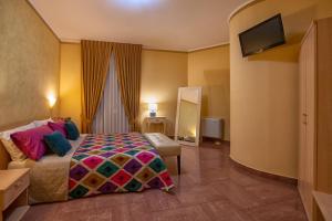 Voodi või voodid majutusasutuse La Collina Hotel & Spa toas