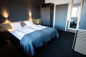 Hotel-B客房内的一张或多张床位