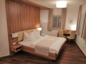 Letto o letti in una camera di Hotel Mauernböck