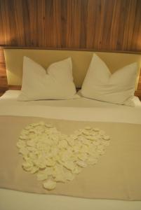 Letto o letti in una camera di Hotel Mauernböck