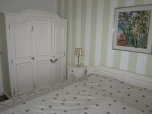 Postel nebo postele na pokoji v ubytování Residenz Weedkroog