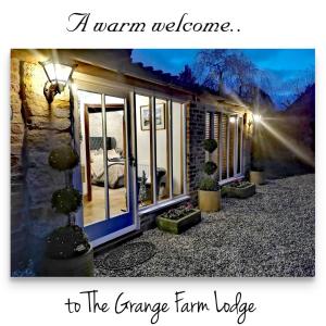 a warm welcome to the orange farm house at Grange Farm Lodge in Ripon