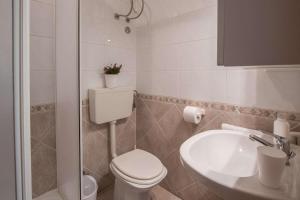 Koupelna v ubytování Apartmani Mirjana Umag