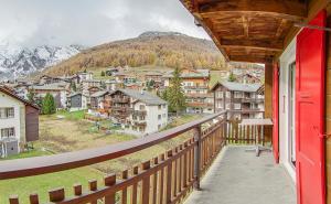 a balcony with a view of a mountain at Anemone in Saas-Fee
