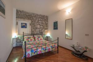 Postel nebo postele na pokoji v ubytování Apartmani Mirjana Umag