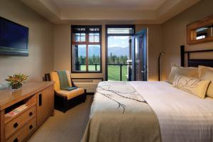 Copper Point Resort tesisinde bir odada yatak veya yataklar