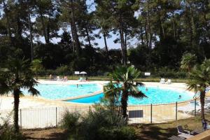 Πισίνα στο ή κοντά στο T2 Mabouya Ondres plage avec piscine et tennis +21 φωτογραφίες