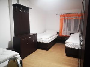 Posteľ alebo postele v izbe v ubytovaní Pokoje o wysokim standardzie
