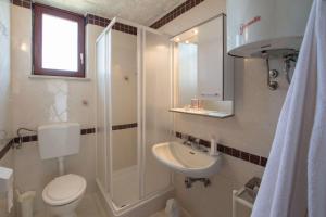 Koupelna v ubytování Apartmani Mirjana Umag