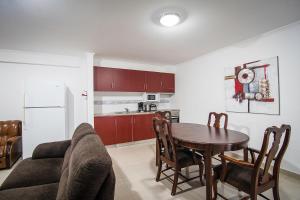 Kuchyň nebo kuchyňský kout v ubytování Costa & Isaias Apartamentos