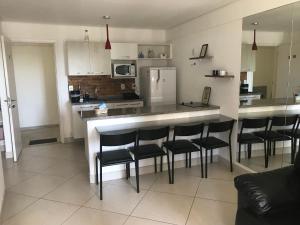 Kjøkken eller kjøkkenkrok på Flat Beira-Mar Landscape
