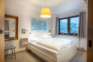 Posteľ alebo postele v izbe v ubytovaní Kaprun Apartments