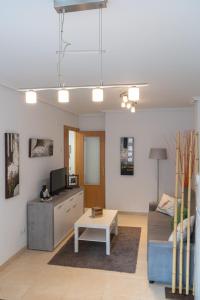 Postel nebo postele na pokoji v ubytování La Xalda, apartamento con piscina a 10 km de Llanes VUT-687-AS + 17 fotografií