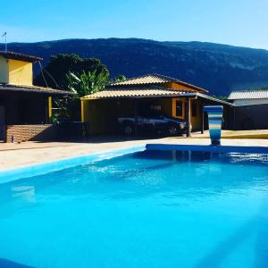 Bazén v ubytování Vila Dos Sonhos Lapinha nebo v jeho okolí
