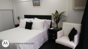 Una cama o camas en una habitación de Recoleta 1443 Boutique Apartments