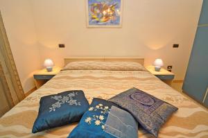 Ліжко або ліжка в номері Villa Marechiaro by Salento Affitti