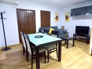 TV a/nebo společenská místnost v ubytování Apartamentos Capuchinas