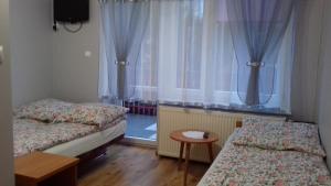 Postel nebo postele na pokoji v ubytování Agroturystyka u Basi