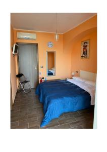 Postel nebo postele na pokoji v ubytování Alloggio Turistico 103
