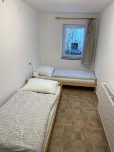 Postel nebo postele na pokoji v ubytování Apartmány Míra