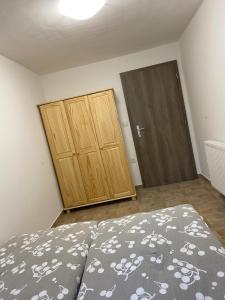 Postel nebo postele na pokoji v ubytování Apartmány Míra