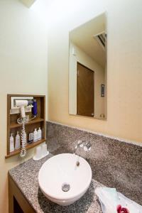 a bathroom with a sink and a mirror at Osaka - Hotel / Vacation STAY 70127 in Osaka