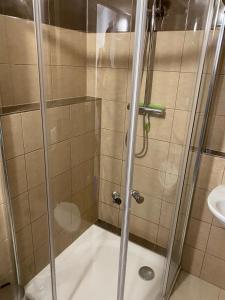 Koupelna v ubytování Apartmány Míra