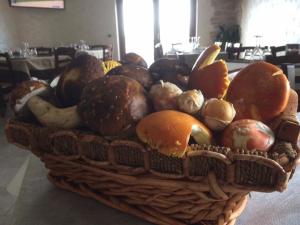 a basket filled with lots of different types of mushrooms at Agriturismo Terra Verde in Rotonda