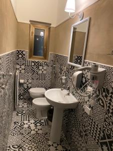 Boutique Hotel Calais Milano tesisinde bir banyo