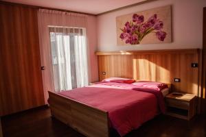 Łóżko lub łóżka w pokoju w obiekcie Villa Lucin