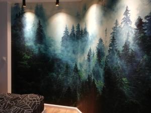 Posteľ alebo postele v izbe v ubytovaní Apartamenty przy Gimnazjalnej