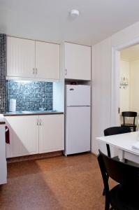 Kuchyň nebo kuchyňský kout v ubytování Briet Apartments