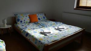 Voodi või voodid majutusasutuse Apartmani Gmitrovic toas