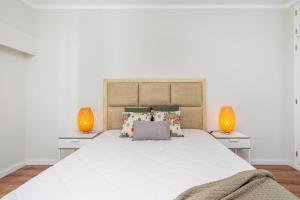 Säng eller sängar i ett rum på Concorde Seaview by Encantos do Algarve - 701