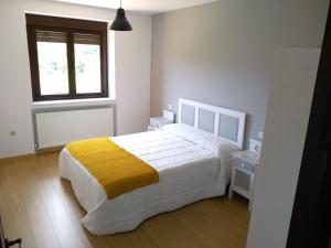 Postel nebo postele na pokoji v ubytování Casa Valdequiruelo