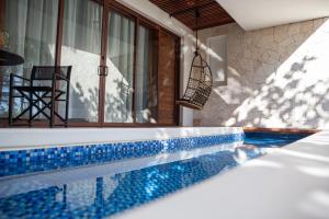 Bazén v ubytování Tago Tulum by G Hotels nebo v jeho okolí