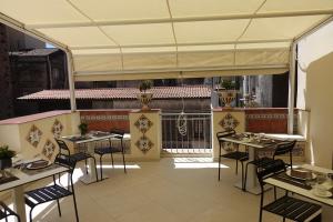ETNEA STYLE CATANIA LUXURY ROOMS的休息区