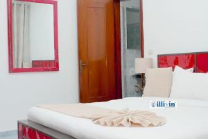 Ein Bett oder Betten in einem Zimmer der Unterkunft ILLIYIN Boutique Hotel