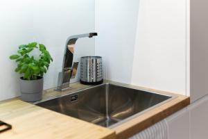 Kuchyňa alebo kuchynka v ubytovaní Apartament Bóżnicza