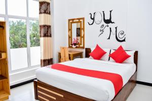 Voodi või voodid majutusasutuse Mallika Resort toas